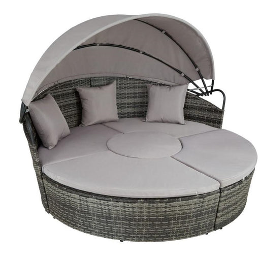 Ramoche's grey rattan day bed with adjustable canopy on a plain background, all put together