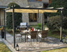 A lifestyle image of the pergola in use, placed on a garden patio and covering a garden dining set